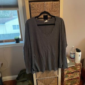 Out from under sweater